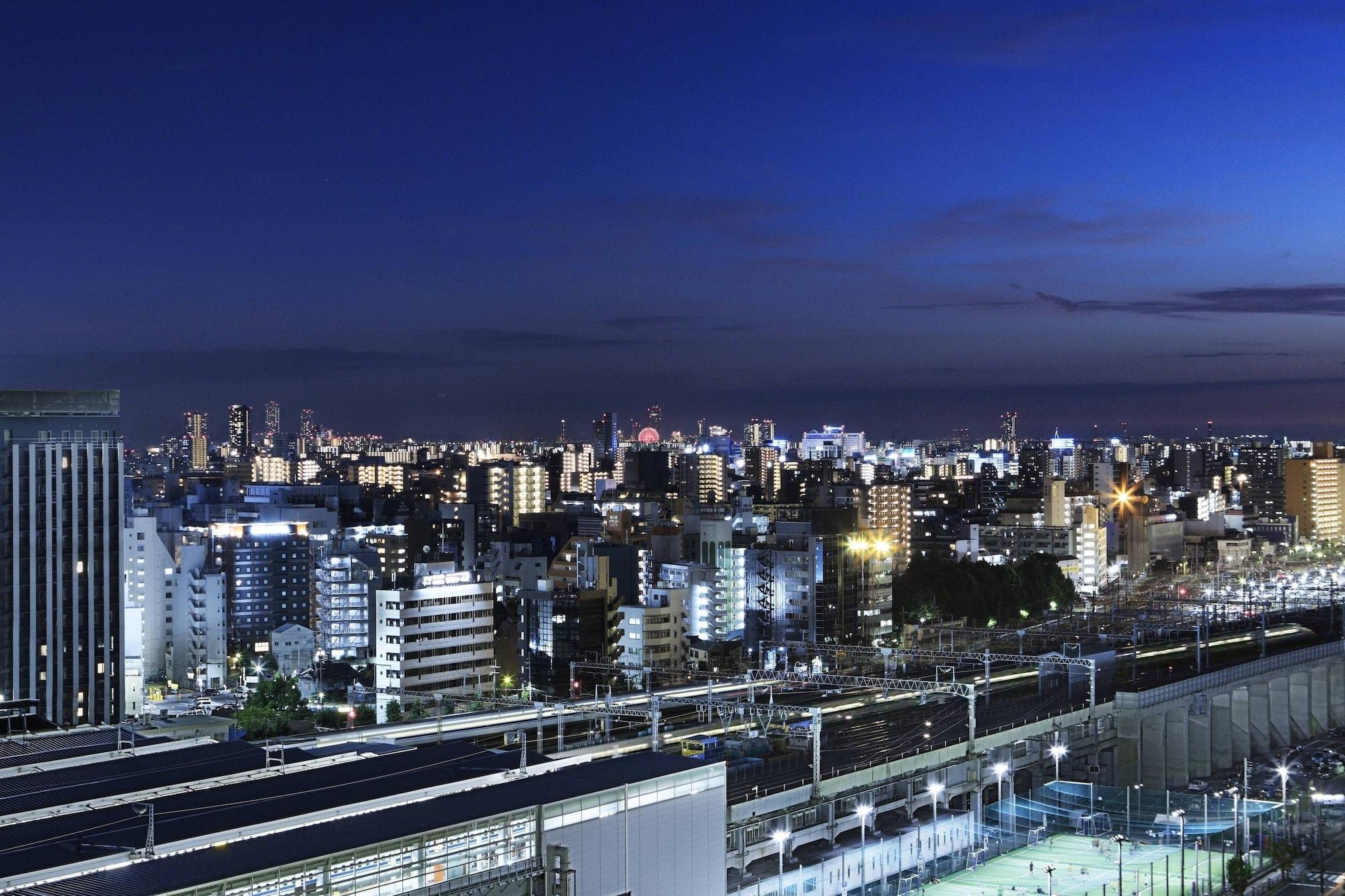 Courtyard By Marriott Shin-Osaka Station Hotel Exterior photo View of the city at night